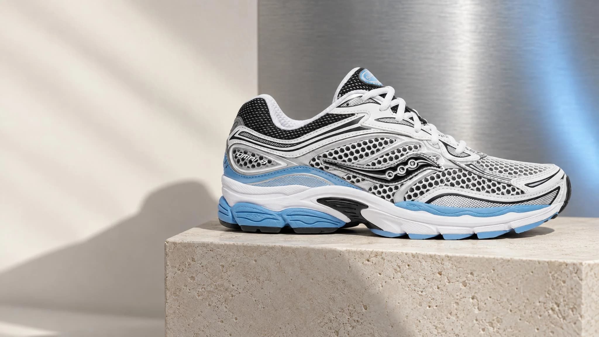 Yenoto AI campaign featuring Saucony ProGrid Omni 9 Blissful / White trainers